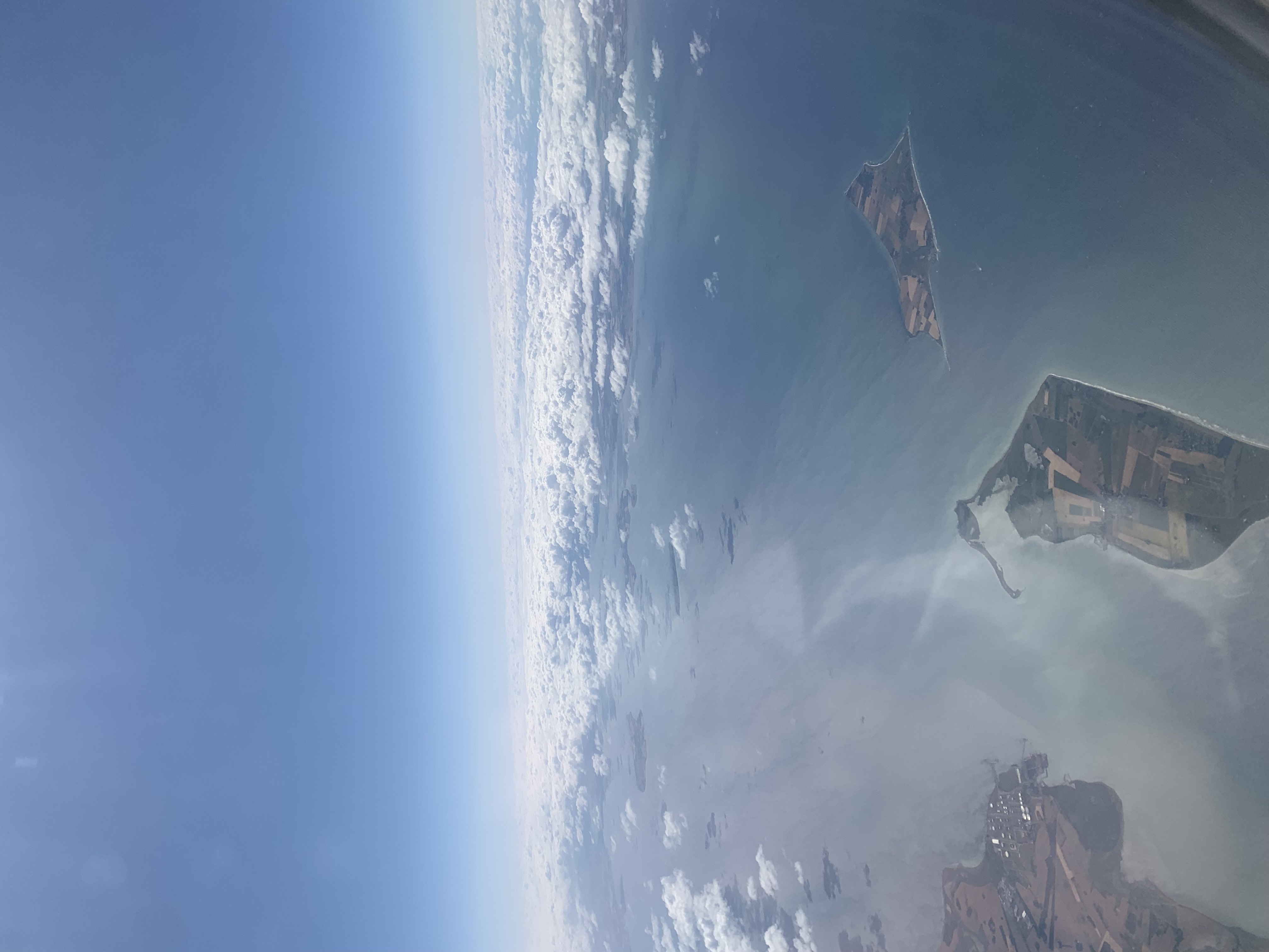 View from the plane on a small island
